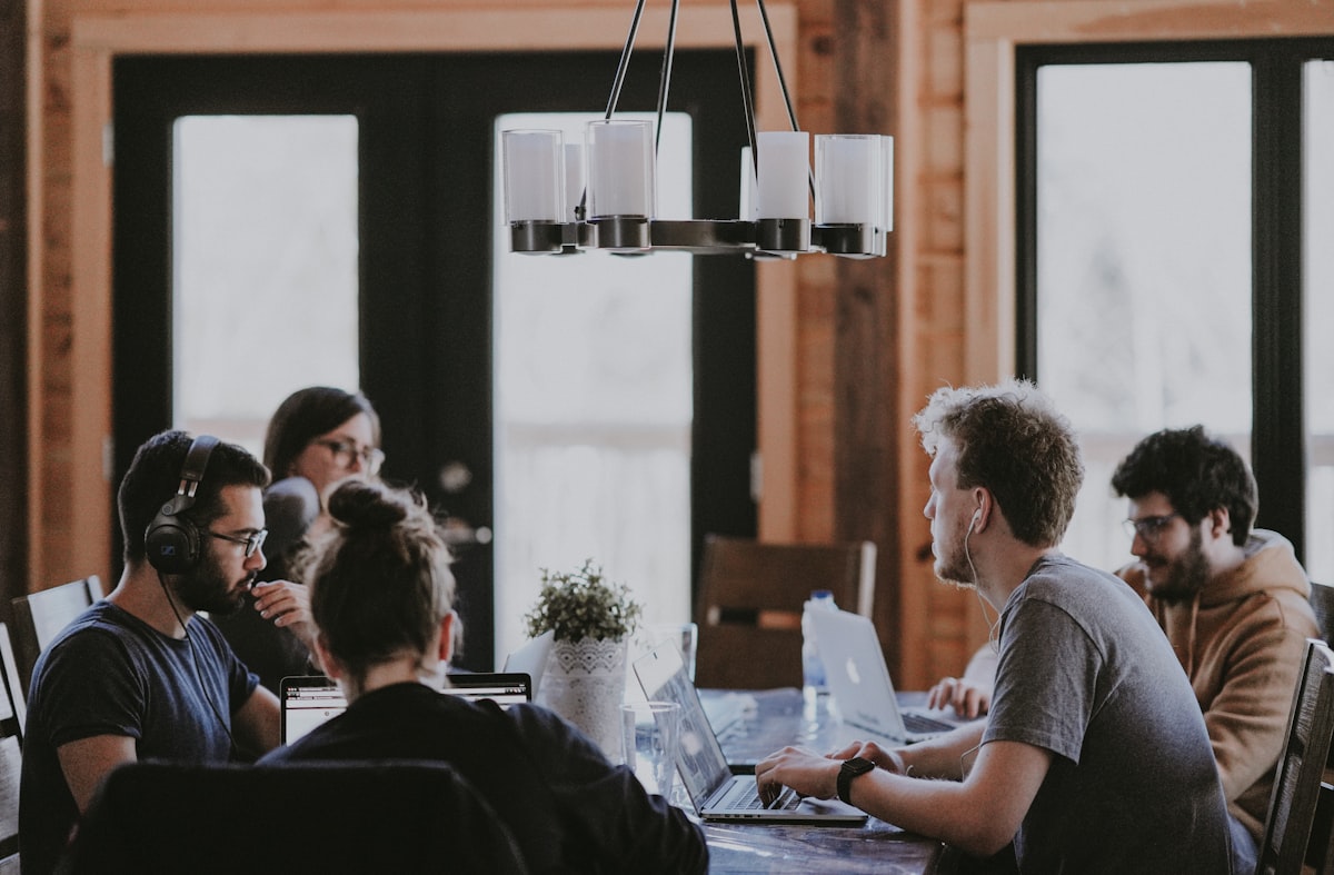 Cross-functional team reviewing AI product roadmap and results