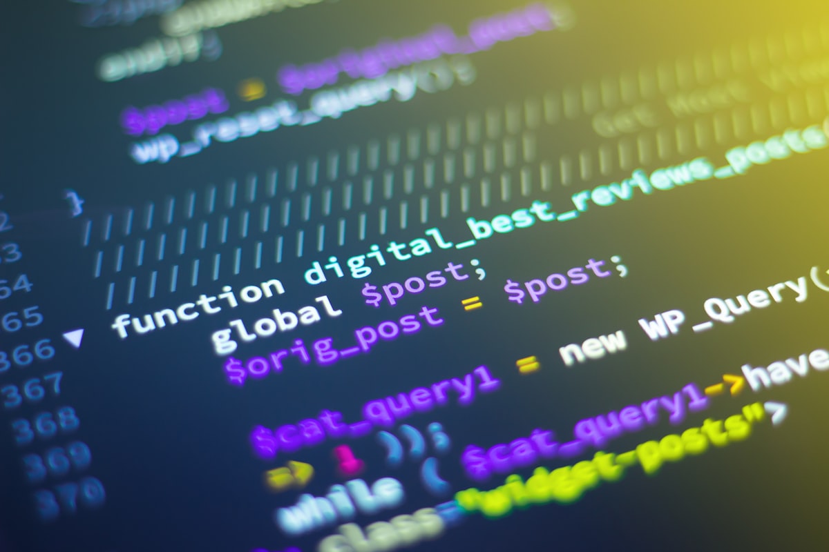 Developer reviewing backend code in a production workflow